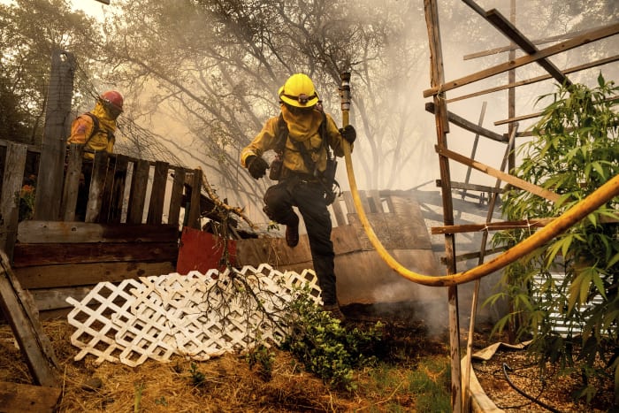 Wildfire sparked by a burning car triples in size in a day. A 42-year-old man is arrested [Video]