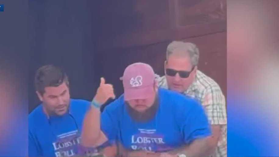 Gov. Sununu gives Heimlich maneuver to lobster roll eating contestant [Video]