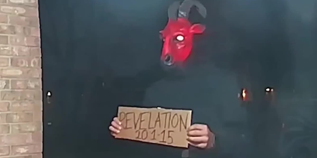 Man in Satanic mask appearing in neighborhood with Bible verse [Video]